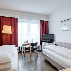 Kleine Kamer met Twee Aparte Bedden